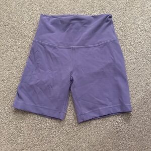 Purple Lululemon biker shorts